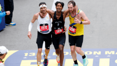 Boston Marathon Heroes: Strangers Help Exhausted Runner Cross Finish Line