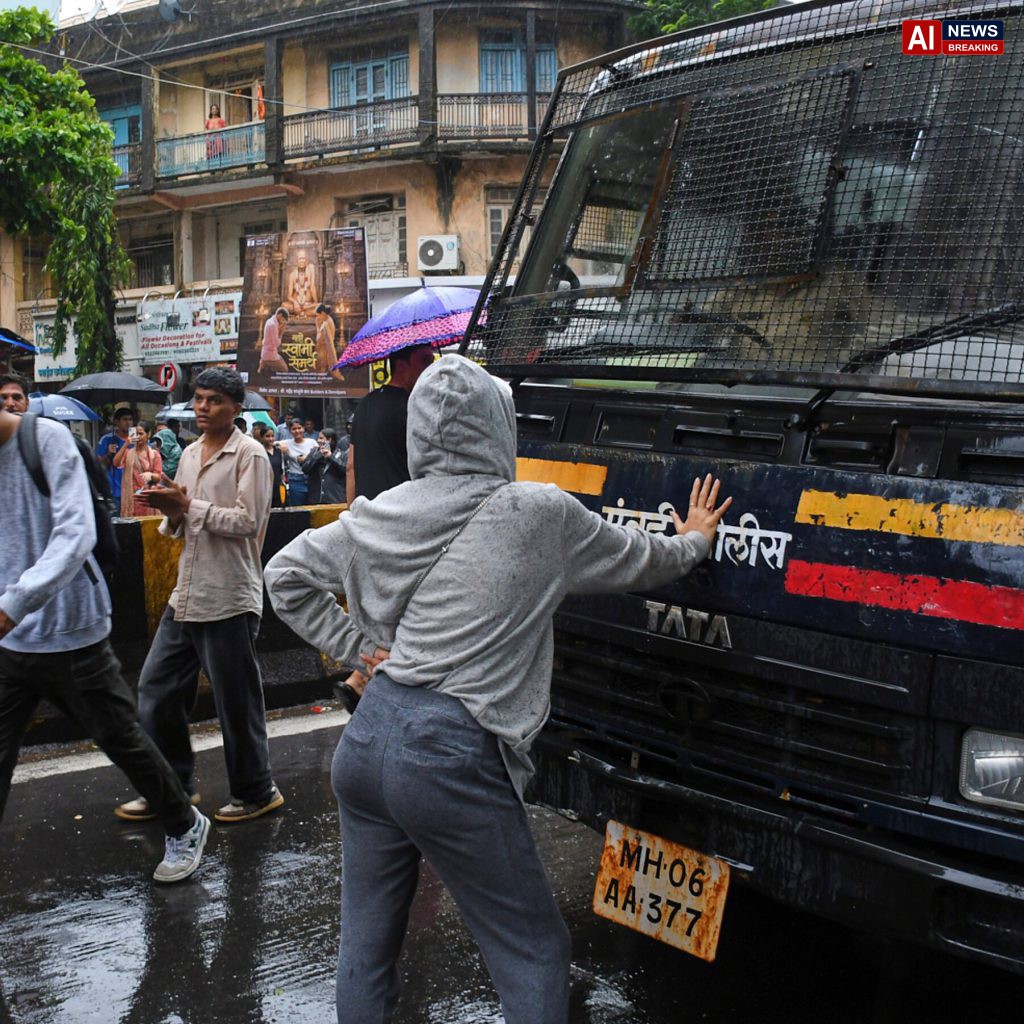 Woman blocks police van in India protest