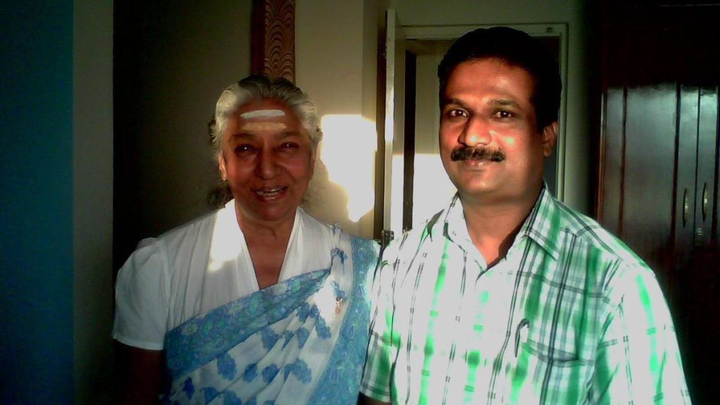 Hassan hotel owner honours S. Janaki with a book written in 2013