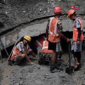 Two workers rescued from collapsed Nepal tunnel nine days after flood