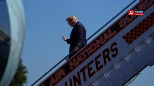 CNN says it was left off Air Force One for Trump's Saturday trip to a college football game